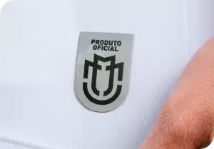 SP< Uniformes - Imagem de patch aplicado em peça.